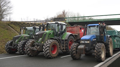 Farmers block a highway during a demonstration near Beauvais, France, Jan. 23, 2024.