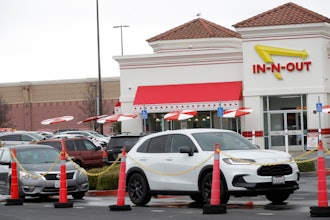Customers line up at the In-N-Out drive-thru off Hegenberger Road in Oakland, Calif., Jan. 22, 2024.