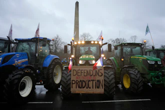 Farmers block a roundabout in Fontainebleau, France, Jan. 26, 2024.