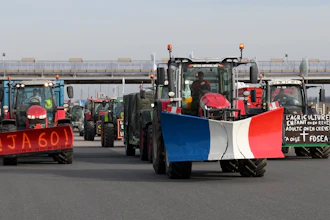 Farmers drive their tractors on a highway leading to Paris near Chamant, France, Jan. 29, 2024.
