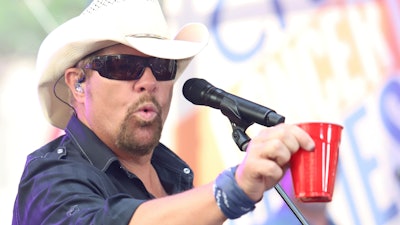 Toby Keith holds a Solo cup while performing on NBC's Today show, New York, July 5, 2019.