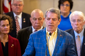 Nebraska Gov. Jim Pillen and state senators at a press conference in the Warner Chamber at the Capitol, Feb. 12, 2024.
