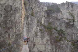 Matt Karlson and Chris Ward of the NROCKS Outdoor Center on a suspension bridge, Circleville, W.Va., March 24, 2015.