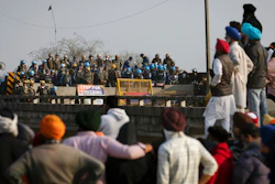 Protesting farmers face a police barricade near Shambhu, India, Feb.16, 2024.