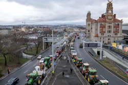 Farmers line their tractors up on a street in Prague, Feb. 19, 2024.