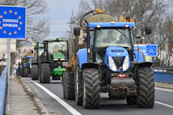 Czech farmers in tractors make their way to the Hodonín/Holíč, Czech-Slovakia border crossing, Feb. 22, 2024.