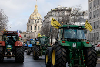 Farmers drive their tractors during a protest in Paris, Feb. 23, 2024.