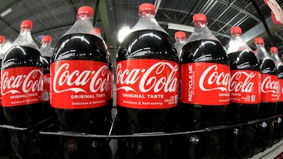 Bottles of Coca Cola are shown in a market in Pittsburgh on Jan. 26, 2023. Coca Cola reports results on Tuesday, Feb. 13, 2024.