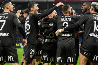 Lens' Kevin Danso celebrates with teammates after scoring against Lyon at the Groupama stadium, Décines-Charpieu, France, March 3, 2024.