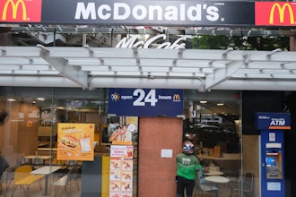 A sign on the door of a McDonald's in Bangkok, March 15, 2024.