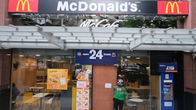 A sign on the door of a McDonald's in Bangkok, March 15, 2024.