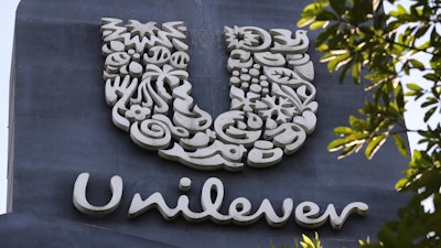 A Unilever logo is displayed outside the head office of PT Unilever Indonesia Tbk. in Tangerang, Indonesia, Tuesday, Nov. 16, 2021.