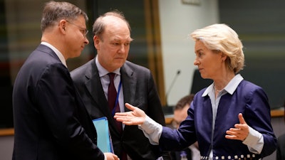 European Commission President Ursula von der Leyen, right, during the tripartite social summit at the European Council building in Brussels, March 20, 2024.