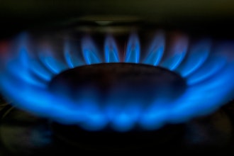 A gas-lit flame on a natural gas stove, March 26, 2024.