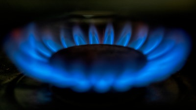 A gas-lit flame on a natural gas stove, March 26, 2024.