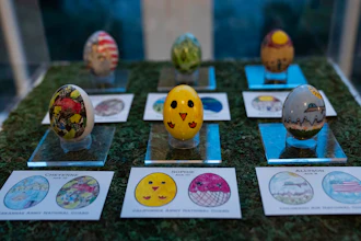 Eggs designed by children of members of the military adorn the East Colonnade of the White House, March 28, 2024.