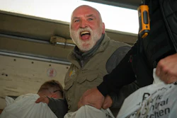 Jose Andres, a Spanish chef and founder of World Central Kitchen, unloads humanitarian food packages, Kherson, Ukraine, Nov. 15, 2022.