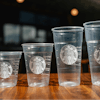 This photo provided by Starbucks shows a new version of the company's cold cup which is said to be made with up to 20% less plastic.