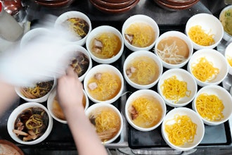 Bowls of noodles for a Tokyo Ramen Tour at Shinbusakiya, a ramen shop which offers 'Hokkaido classics,' Tokyo, April 2, 2024.