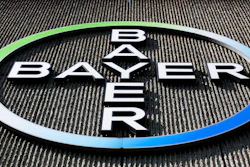 The Bayer AG corporate logo is displayed on a building of the German drug and chemicals company in Berlin, Monday, May 23, 2016.