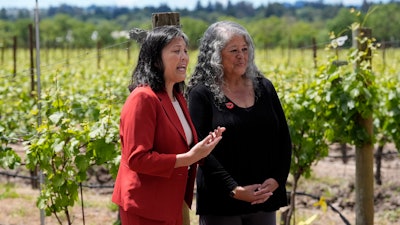 Acting Labor Secretary Julie Su, left, and Teresa Romero, president of United Farm Workers, at Balletto Vineyards, Santa Rosa, Calif., April 26, 2024.