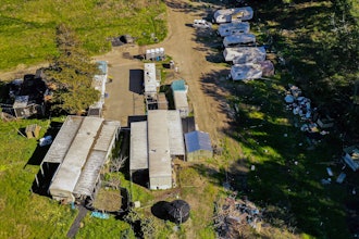 A drone photo of mobile homes at the California Terra Garden, formerly Mountain Mushroom Farm, in Half Moon Bay, Calif., Jan. 26, 2023.
