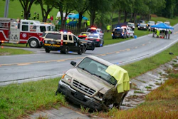 Emergency personnel respond to the scene of a deadly crash near Dunnellon, Fla., May 14, 2024.