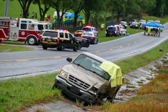 Emergency personnel respond to the scene of a deadly crash near Dunnellon, Fla., May 14, 2024.