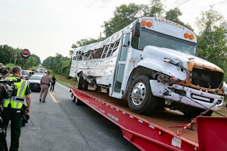 A bus is removed after it collied with a pickup in Ocala, Fla., May 14, 2024.