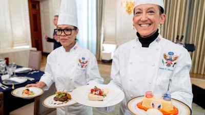 White House executive chef Cris Comerford, left, and executive pastry chef Susie Morrison in the State Dining Room, Nov. 30, 2022.