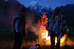 Farmers take part in a ceremony honoring Mother Earth and Father Snowy Mountain, Pitumarca, Peru, April 4, 2018.