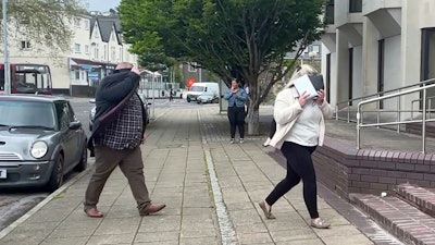 In a still image taken from video, Ann and Bernard McDonagh arrive at Swansea Crown Court, Swansea, Wales, May 29, 2024.