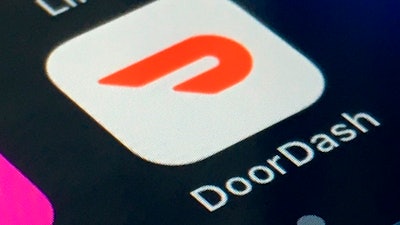 The DoorDash app is shown on a smartphone on Feb. 27, 2020, in New York. DoorDash will reports earnings on Wednesday, May 1, 2024