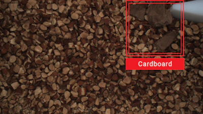 As shown here, AI foreign material detection technology offers expansive capabilities to detect challenging materials missed by most inspection methods, such as cardboard on a chopped almond conveyor.