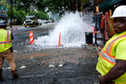 Workers respond to a broken water transmission line, Atlanta, June 1, 2024.