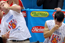 Joey Chestnut and Takeru Kobayashi competing in 2009.