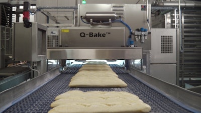 The vision process control system monitors baguette dough for height, scoring depth, and other pre-baking quality features.