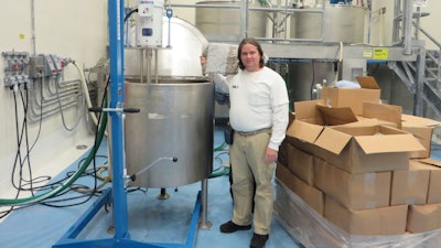 Dr. Aaron T. Dossey of All Things Bugs LLC, using his patented spray drying process to manufacture cricket powder.