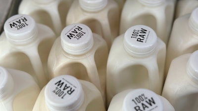 Bottles of raw milk from from Raw Farm of Fresno, Calif., displayed at a store in Temecula, Calif.