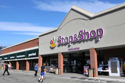People walk outside a Stop & Shop in Newport, R.I.