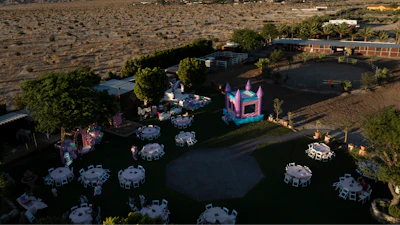 Carlos Ulloa's Rancho El Refugio date palm ranch decorated for a baptism ceremony in Thousand Palms, Calif.