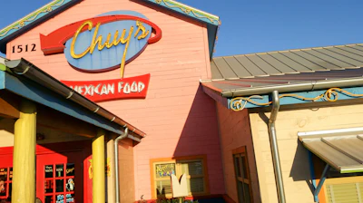 Exterior entrance of Chuy's Mexican restaurant in College Station, TX.