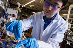 Feng-Yang Chen with the reactor system prototype that is the subject of a new research study published in Nature Catalysis.