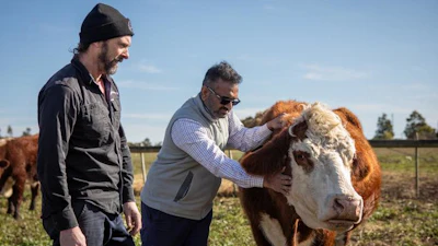 Chris Balazs, farmer and CEO of Provenir (left), and RMIT Professor Rajaraman Eri on an Australian cattle farm.