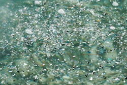 Microplastic pollution in the ocean.