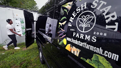 Vegetables are loaded onto a delivery truck at Fresh Start Farm, Dunbarton, N.H., Aug. 19, 2024.