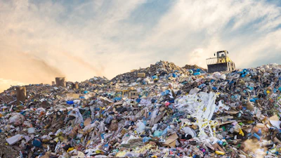Food waste scattered across a landfill.