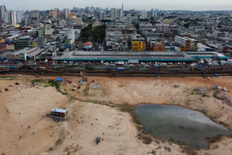 A part of the Negro River is dry at the port in Manaus, Brazil, Oct. 4, 2024.