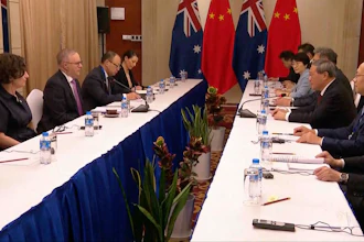 In this image made from Australia Pool video, Australian Prime Minister Anthony Albanese, second left, talks with Chinese Premier Li Qiang, second right, on the sidelines of ASEAN summit talks, Vientiane, Laos, Oct. 10, 2024.