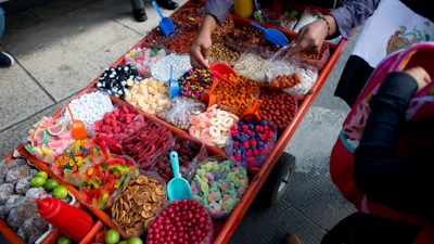 A street vendor sells sweet snacks in Mexico City, July 5, 2016.